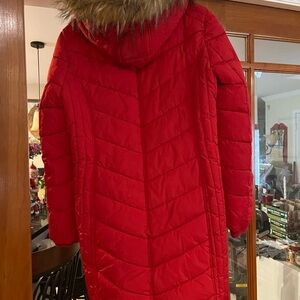 Red Tommy Hilfiger puffer coat with faux fur hood
